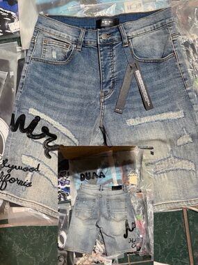 AMIRI Light Wash Distressed Embroidered Denim Shorts - Blue